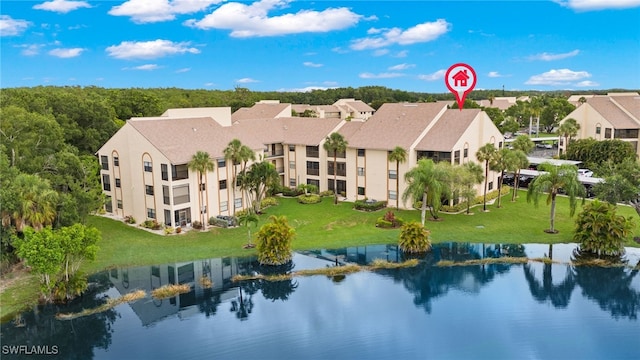 bird's eye view with a water view