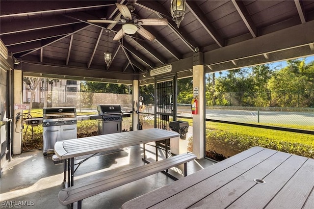 view of patio / terrace with ceiling fan, area for grilling, and a gazebo