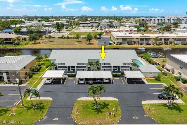 drone / aerial view with a water view