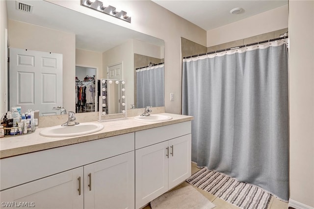 bathroom with double sink vanity