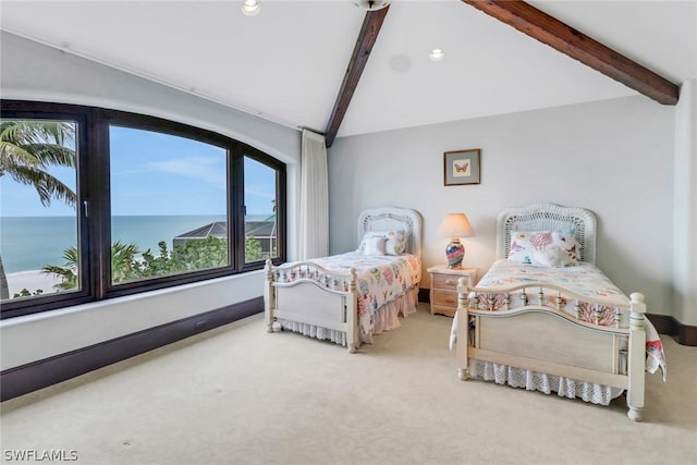 carpeted bedroom featuring a water view and vaulted ceiling with beams