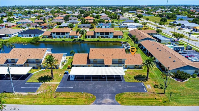 drone / aerial view featuring a water view