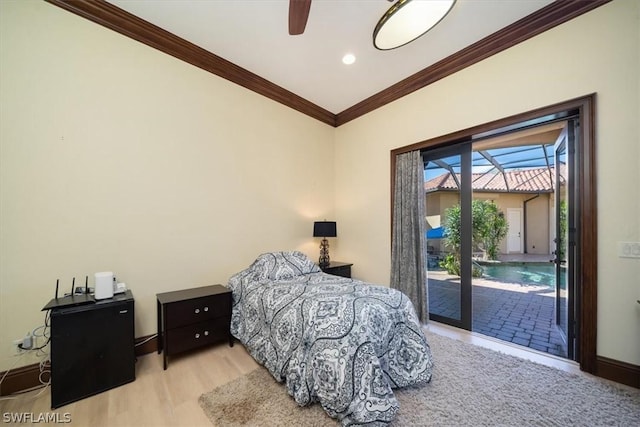 bedroom with ornamental molding, ceiling fan, light hardwood / wood-style flooring, and access to exterior