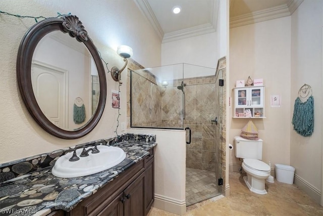 bathroom featuring toilet, crown molding, walk in shower, and vanity