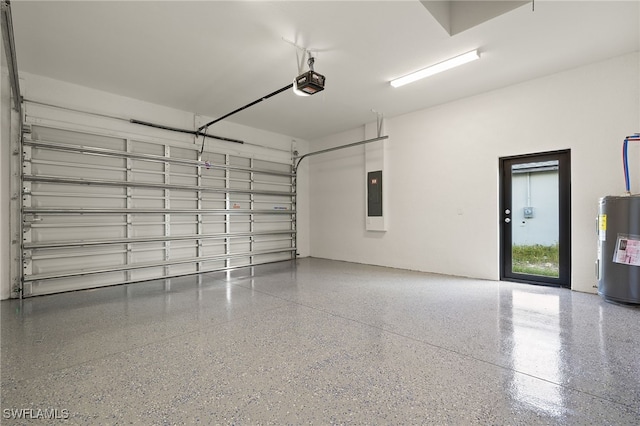 garage featuring water heater, a garage door opener, and electric panel