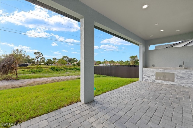 view of patio featuring an outdoor kitchen