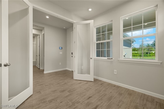 empty room featuring french doors