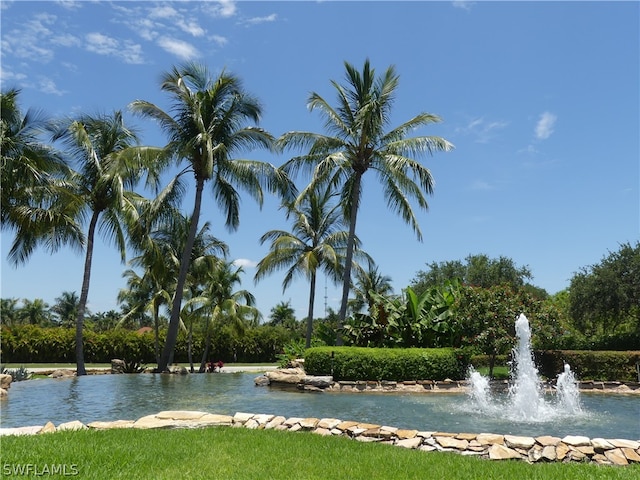 view of home's community featuring a water view