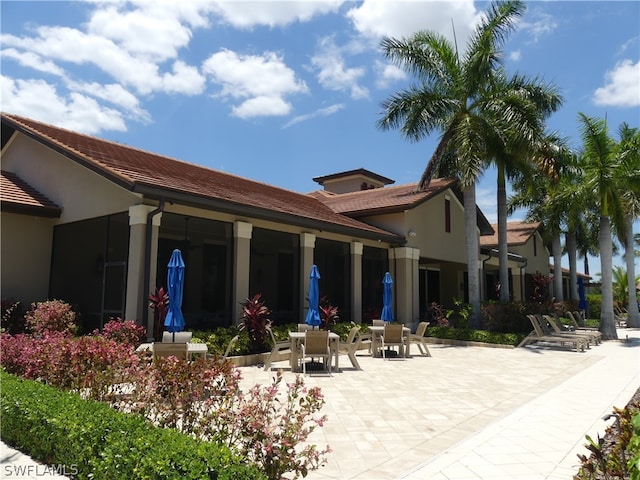 rear view of house featuring a patio area