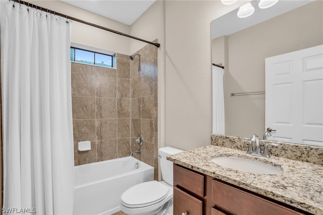 full bathroom featuring vanity, toilet, and shower / bath combo with shower curtain