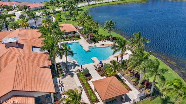 drone / aerial view with a water view