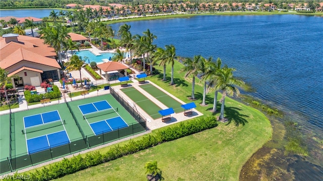 birds eye view of property featuring a water view