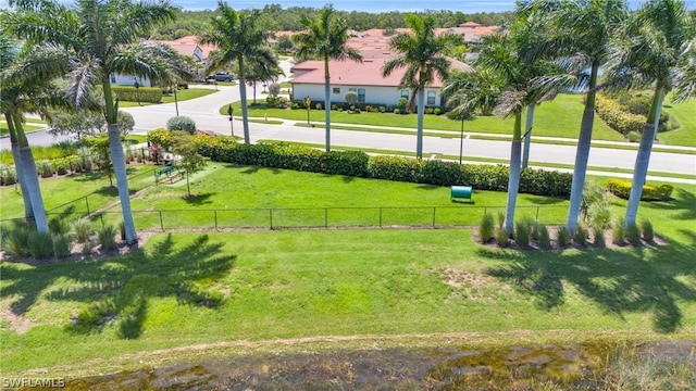 view of community featuring a lawn