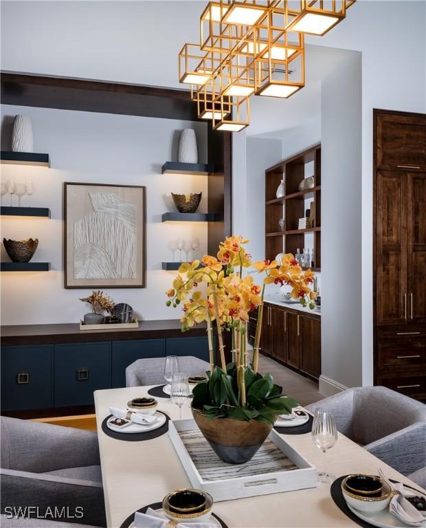 dining room featuring a notable chandelier