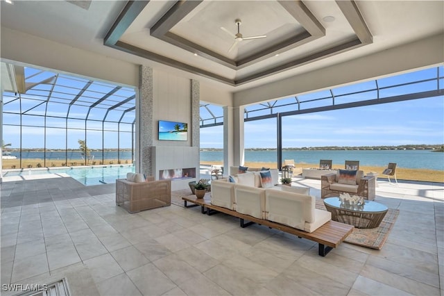 view of patio with a water view, an outdoor hangout area, and glass enclosure