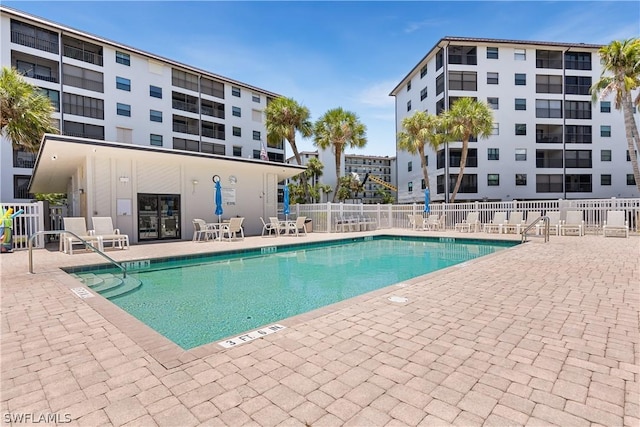 view of pool featuring a patio