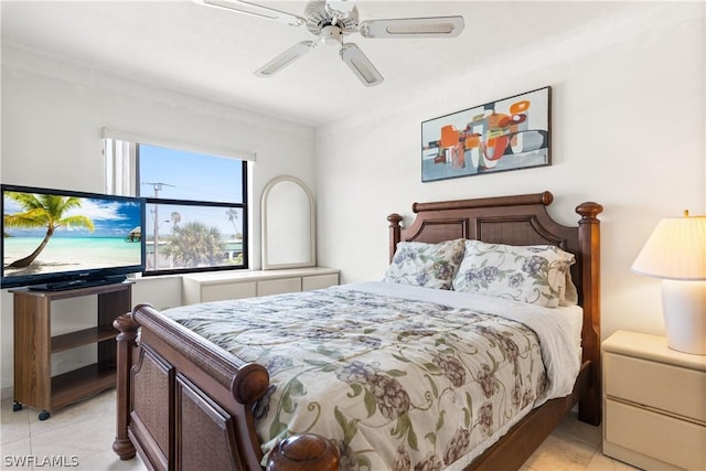 tiled bedroom with ceiling fan