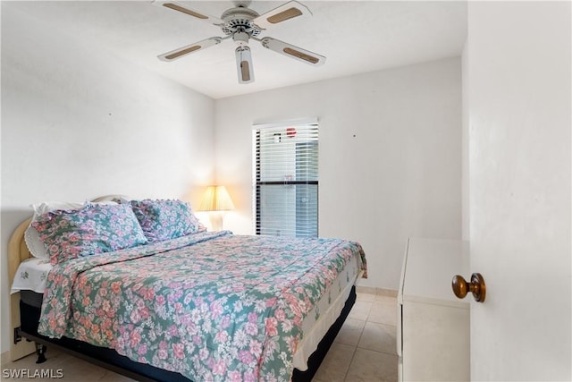 bedroom featuring ceiling fan and light tile patterned flooring