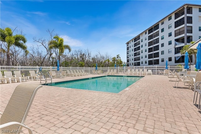 view of swimming pool with a patio area