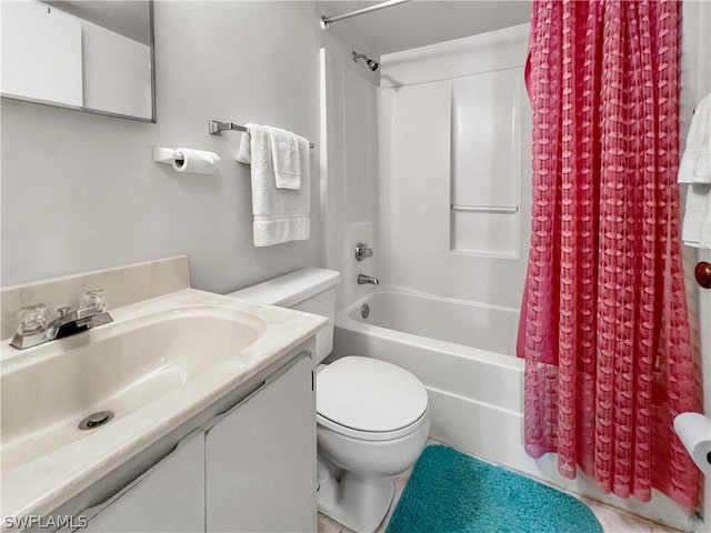 full bathroom featuring shower / tub combo with curtain, vanity, and toilet