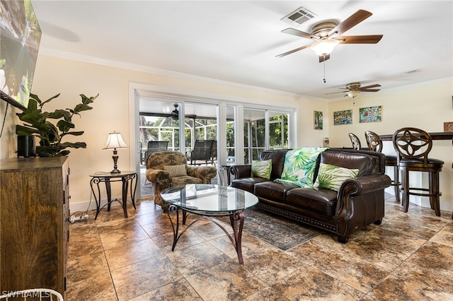 living room with ceiling fan and ornamental molding