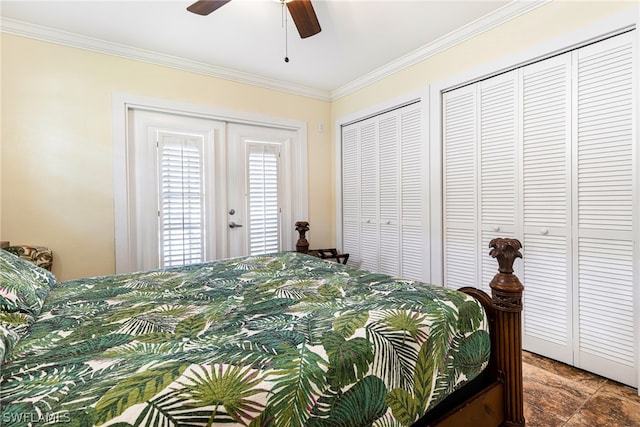 bedroom featuring multiple closets, ceiling fan, french doors, and ornamental molding