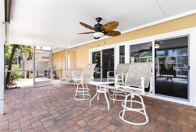 view of patio with ceiling fan