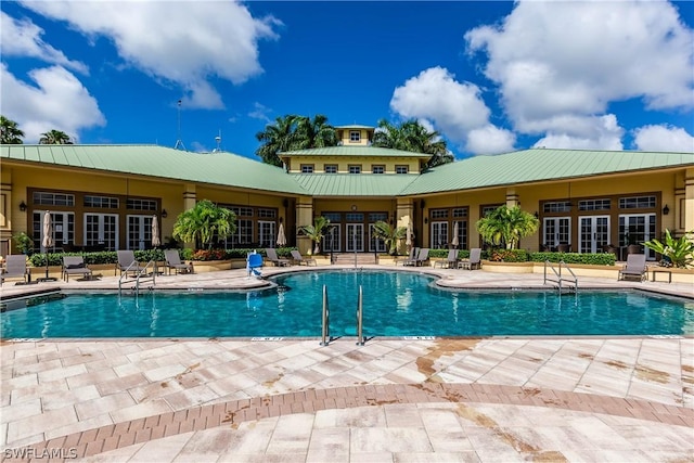 view of pool featuring a patio area