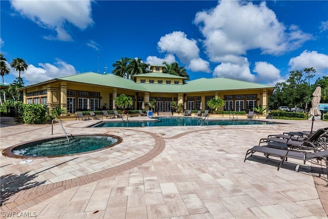 view of swimming pool with a patio area