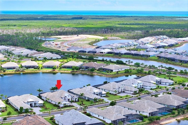 bird's eye view with a water view