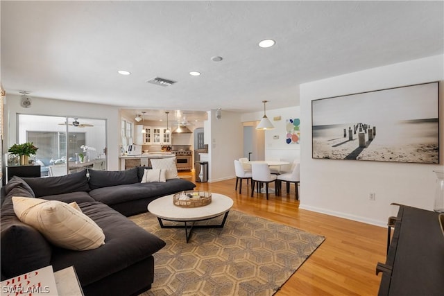 living room with hardwood / wood-style floors