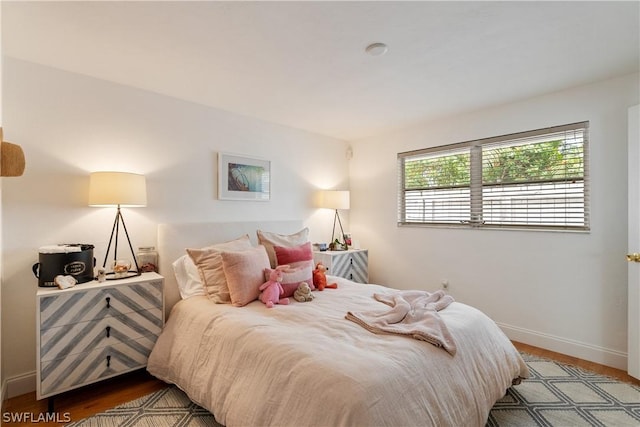 bedroom featuring hardwood / wood-style floors