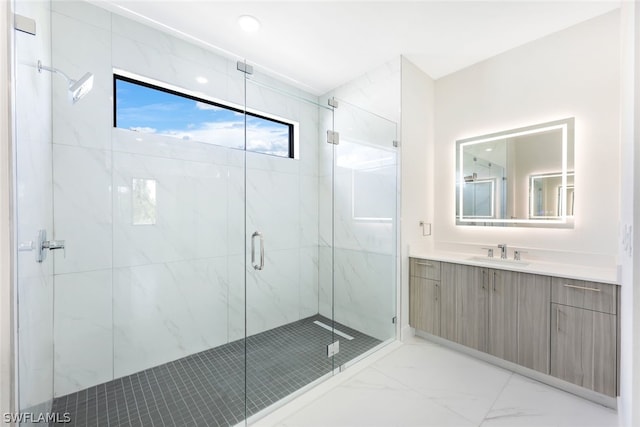 bathroom with vanity and an enclosed shower