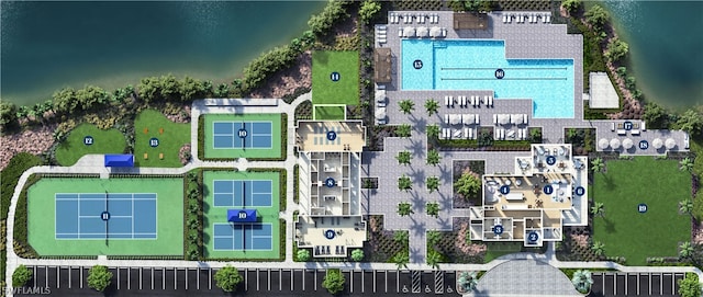 birds eye view of property with a water view