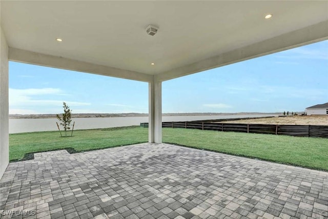 view of patio / terrace with a water view