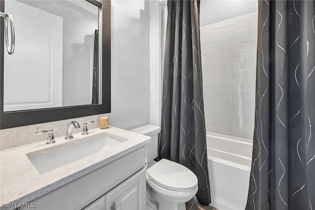 full bath featuring vanity, toilet, and shower / tub combo with curtain