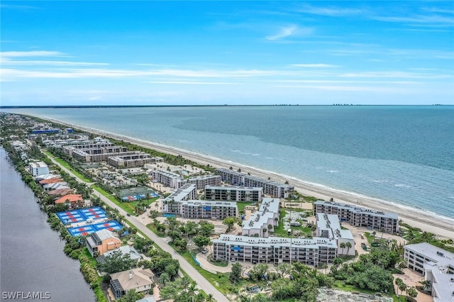 aerial view featuring a water view and a beach view