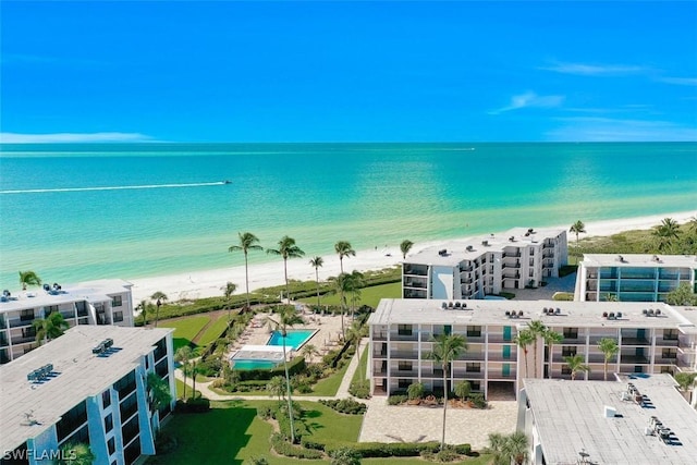 aerial view with a view of the beach and a water view