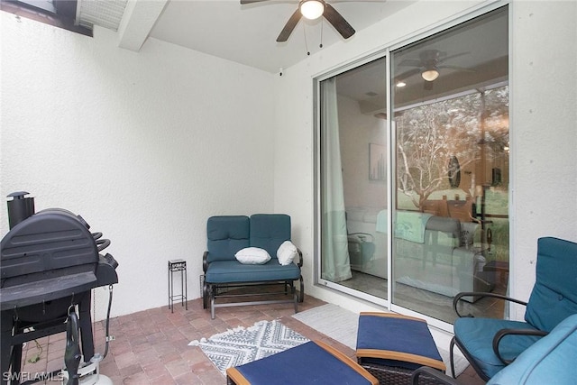 view of patio / terrace featuring ceiling fan