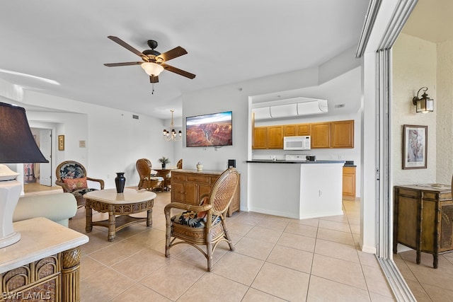 dining space featuring light tile flooring and ceiling fan