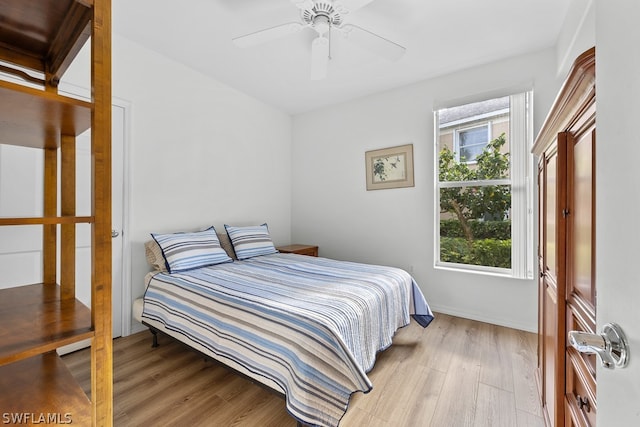 bedroom featuring ceiling fan and light wood-type flooring