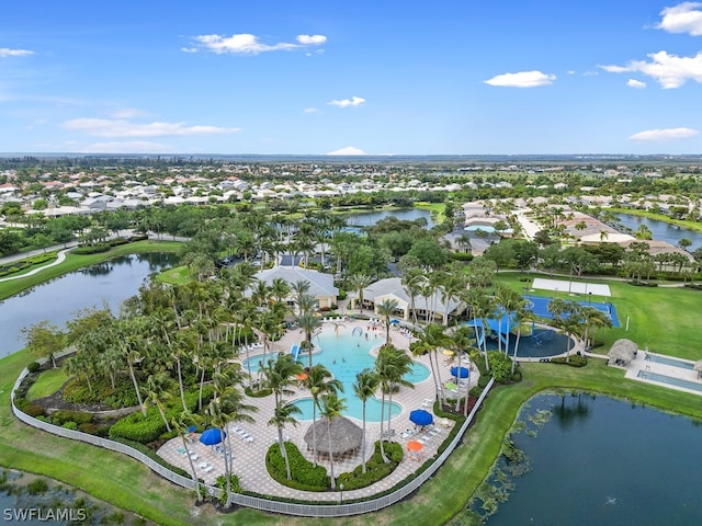 birds eye view of property featuring a water view