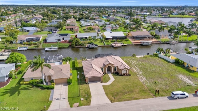 bird's eye view with a water view