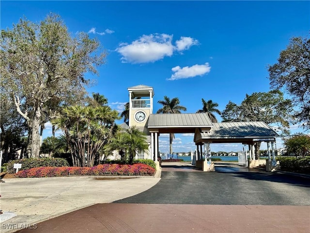 surrounding community featuring driveway and a gazebo