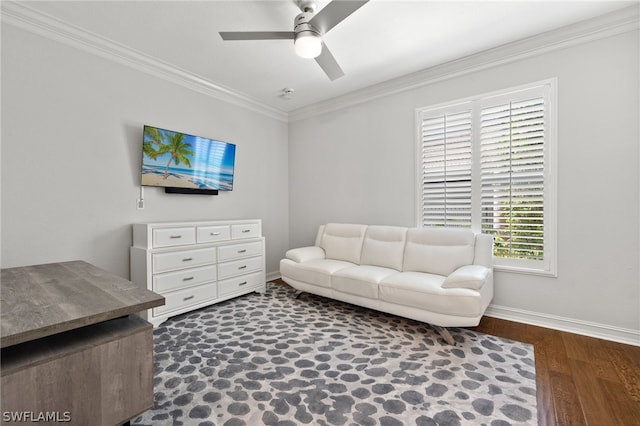 interior space with ceiling fan, ornamental molding, and dark hardwood / wood-style flooring