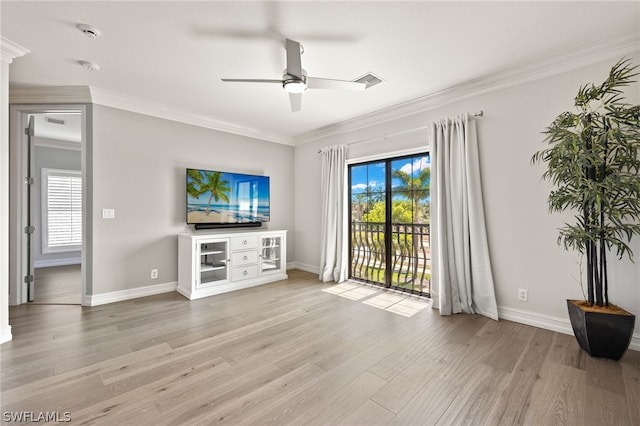 unfurnished living room featuring crown molding, light hardwood / wood-style flooring, and ceiling fan