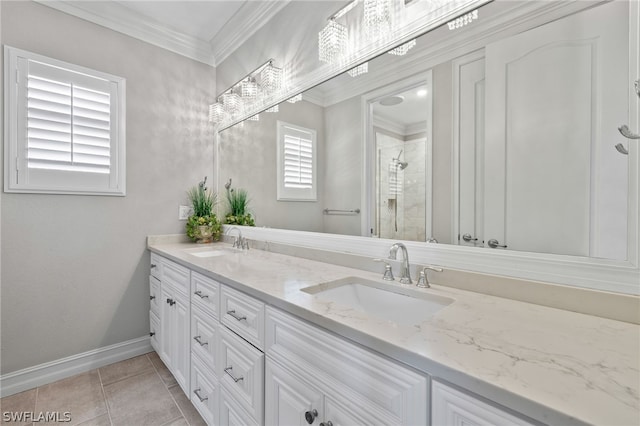 bathroom with crown molding, vanity, tile patterned floors, and a shower with shower door