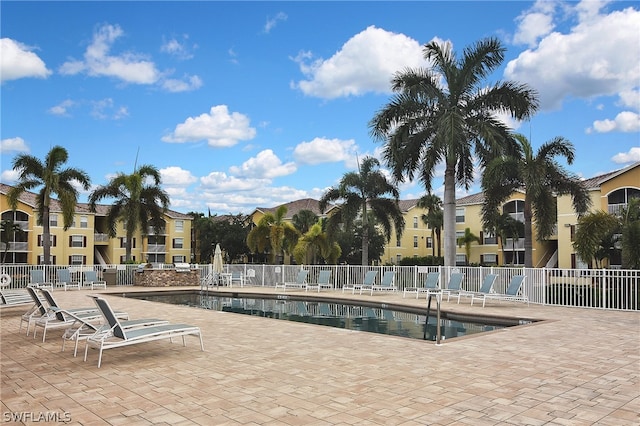 view of swimming pool featuring a patio area