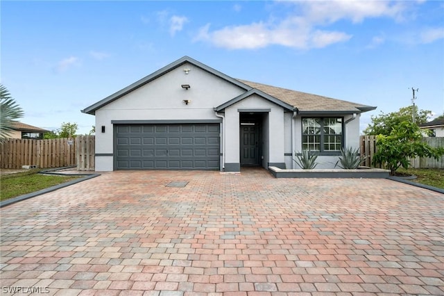 view of front of home with a garage