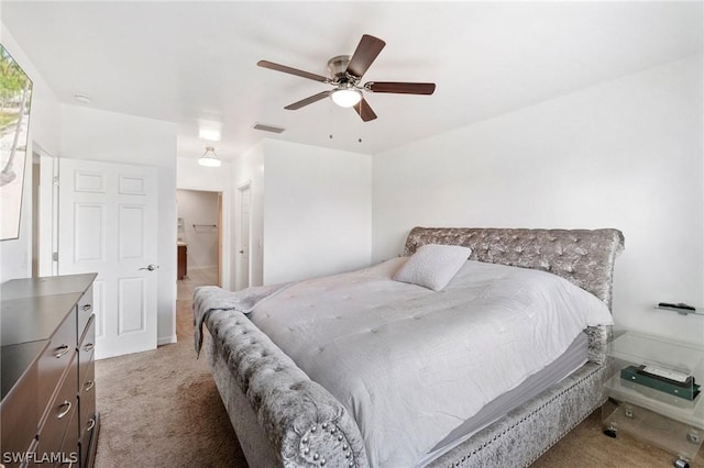 bedroom with light colored carpet and ceiling fan